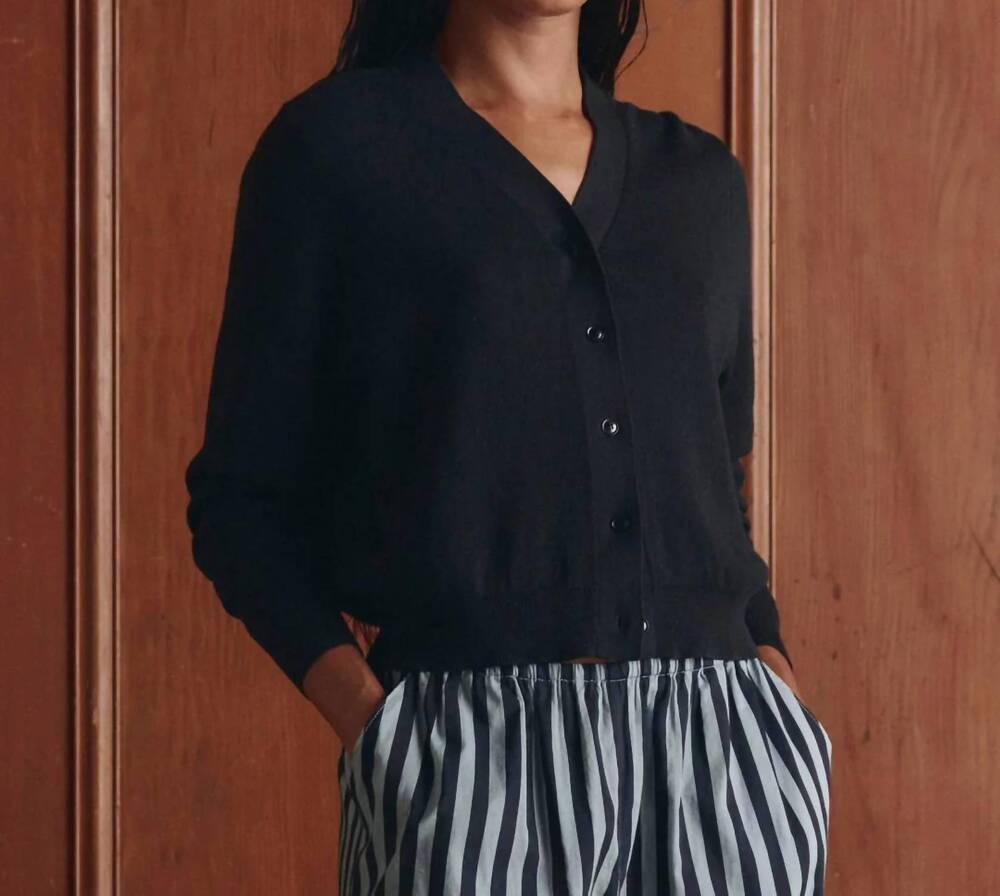 NEW THE GREAT. the shrunken v neck cardigan in black